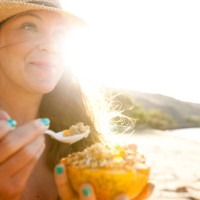 a female enjoying a day at the beach. - food stock pictures, royalty-free photos & images