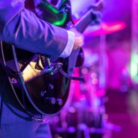 a guitarist plays at a rock or rock n roll concert. - concert stock pictures, royalty-free photos & images