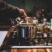 a man preparing dinner - food stock pictures, royalty-free photos & images