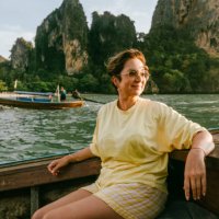 a mature woman sitting on the boat - travel stock pictures, royalty-free photos & images