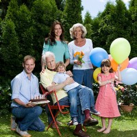 a multi-generational family celebrating a birthday, outdoors - garden decoration stock pictures, royalty-free photos & images