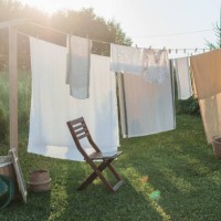 a place for drying linen,sheets and clothes on the street in the - garden decoration photos et images de collection