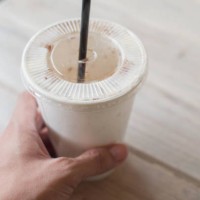 a single-use white plastic cup with drinking straw - junk food stock pictures, royalty-free photos & images