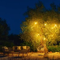 a tranquil garden at summer night - garden decoration stock pictures, royalty-free photos & images