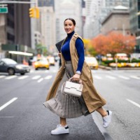 a woman seen running across the street in new york during a busy work day - fashion stock pictures, royalty-free photos & images