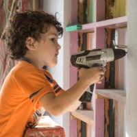 a young boy plays construction worker - home decoration stock pictures, royalty-free photos & images