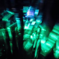 abstract colorful surreal cyberpunk night city lights bokeh on black background - concert stock pictures, royalty-free photos & images