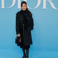 Actress and singer Ashley Park poses upon arrival ahead of Christian Dior Women Ready-to-wear Spring-Summer 2025 show as part of the Paris Fashion...