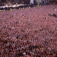 Aerial view of a large crowd in the audeicne at Freddie Mercury tribut concert, Wembley Stadium, London, 20th April 1992.