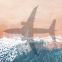 aerial view of an airplane shadow over a sandy beach. - travel stock pictures, royalty-free photos & images