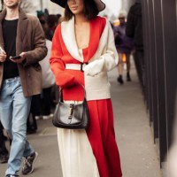 Aimee Song is seen wearing a color-blocked red and white outfit and wide-brimmed hat outside Gucci during the Milan Fashion Week Womenswear...