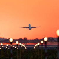 airplane taking off at sunrise, travel and tourism - travel stock-fotos und bilder