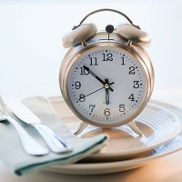 alarm clock on plate - food stock pictures, royalty-free photos & images