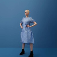 albino woman standing with hand on hip - fashion stock pictures, royalty-free photos & images
