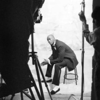 American basketball player Micheal Jordan sits on a stool as he poses, modeling samples from a line of formalwear, during a photo shoot, Chicago,...