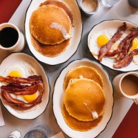 american breakfast at the diner with fried eggs, bacon and pancakes - food stock pictures, royalty-free photos & images