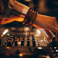 american dj working with sound, spinning turntable records at a night club party - concert stock pictures, royalty-free photos & images