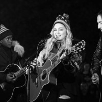 American Pop musician Madonna plays guitar during a surprise concert in support of Hillary Clinton's presidential candidacy, on the eve of Election...