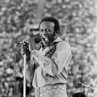 American singer, songwriter and musician Bobby Womack performs at the 1973 Watts Summer Festival concert, held at the Los Angeles Memorial Coliseum...