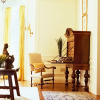 an armchair is kept beside a wooden cabinet in a house - home decoration stock pictures, royalty-free photos & images