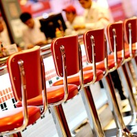 an empty red seats in the restaurant - junk food stock pictures, royalty-free photos & images