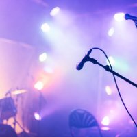 an illuminated concert stage - stock photo - concert stock pictures, royalty-free photos & images