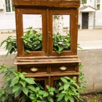 an old broken wardrobe stands on the street as a decor - garden decoration stock pictures, royalty-free photos & images