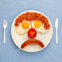 an unhappy fast-food breakfast - food stock pictures, royalty-free photos & images