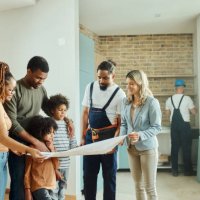 analyzing blueprints in moving house! - home decoration stockfoto's en -beelden
