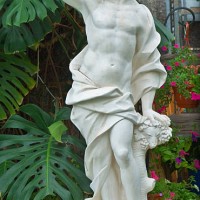 ancien statue in the garden - garden decoration stock pictures, royalty-free photos & images