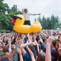 Andrew McMahon of Andrew McMahon In The Wilderness rides an inflatable duck over the crowd while performing during the Summer Camp Music Festival...