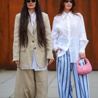 Angela Rozas Saiz wears a white cap, a white shirt, a beige oversized blazer jacket, matching pants, a beige fur sandals, sunglasses, Aida Domenech...