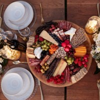 appetizer plate amidst crockery on dining table - garden decoration stock pictures, royalty-free photos & images