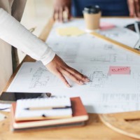 architecture, blueprint or hands in a meeting planning a creative strategy or building ideas together. people, brainstorming or designers speaking of project job goals with team work or collaboration - fashion stock pictures,