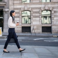 asian business woman walking on the street drinking a cup of coffee - junk food stock pictures, royalty-free photos & images