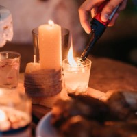asian chinese doing preparation and light up the candle before christmas party begin at roof top of house - garden decoration stock pictures, royalty-free photos & images