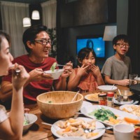 asian chinese family and cousins having reunion dinner at home - food stock pictures, royalty-free photos & images