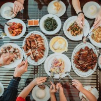 asian chinese family enjoy their home made food during chinese new year's eve reunion dinner - food stock pictures, royalty-free photos & images