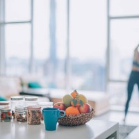 asian chinese female home workout in domestic living room facing the city - food stock pictures, royalty-free photos & images