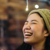 asian chinese female smiling during celebrate christmas party at roof top of house - garden decoration stock pictures, royalty-free photos & images