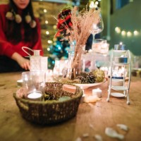 asian chinese female standing behind the decoration table during celebrate christmas party at roof top of house - garden decoration stock pictures, royalty-free photos & images