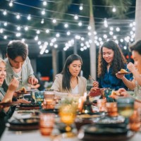 asian chinese lesbian couple celebrating birthday outdoor dining with friends - food stock pictures, royalty-free photos & images