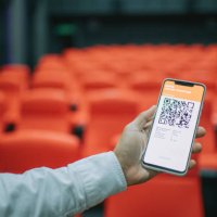 asian chinese man using mobile app cinema movie e-ticketing reservation looking for seat inside cinema hall - concert stock pictures, royalty-free photos & images