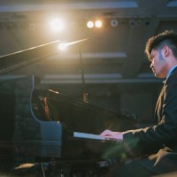 asian chinese teenage boy pianist performing solo on stage - concert stock pictures, royalty-free photos & images