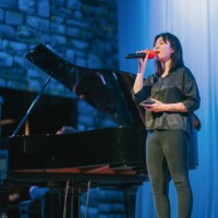 asian chinese young female opera singer enjoy practising solo on stage with pianist - concert stock pictures, royalty-free photos & images