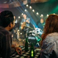 asian couple celebrating at party. - concert stock pictures, royalty-free photos & images
