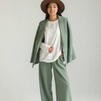 asian fashionable woman model posing in a beautiful outfit and hat on a white background on a cyclorama. - fashion stock pictures, royalty-free photos & images