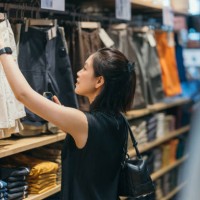 asian gen-z shopping moment choosing cloths and fashion costume new style in department store bangkok thailand - fashion stock pictures, royalty-free photos & images