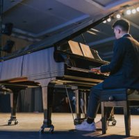 asian talented chinese pianist performing on stage - concert stock pictures, royalty-free photos & images