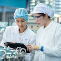 asian woman teaching team work in working on food and beverage safety. - food stock pictures, royalty-free photos & images
